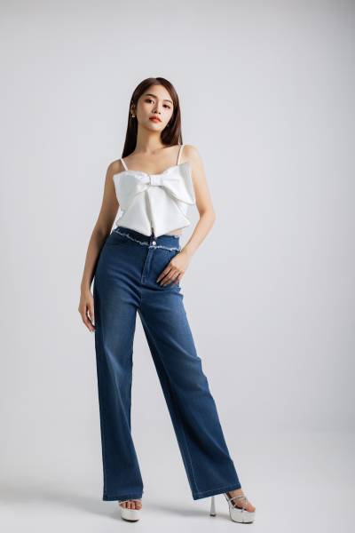 Statement White Bow Top & High-Waist Jeans